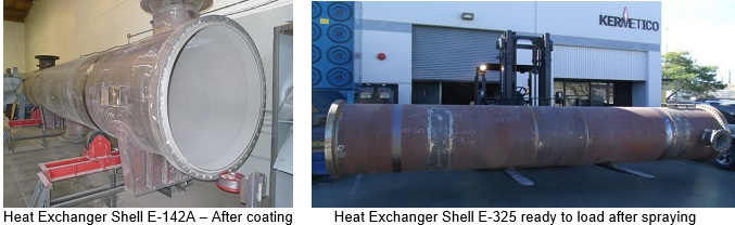 Industrial heat exchanger shells undergoing coating and spraying.