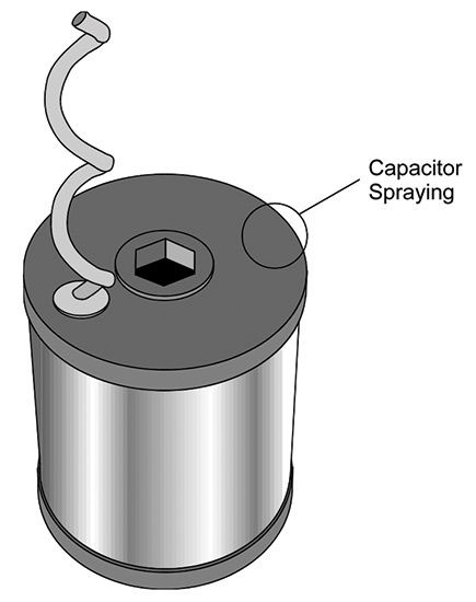 Cylindrical metal container with a flexible hose attached to a top nozzle, labeled Capacitor Spraying.