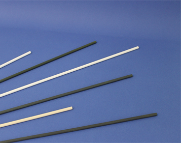 Several thin white and dark gray sticks arranged diagonally on a blue background.