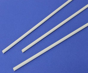 Three white cylindrical rods on a blue background.