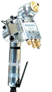 Metal gas regulator with brass fittings and attached steel tubing.