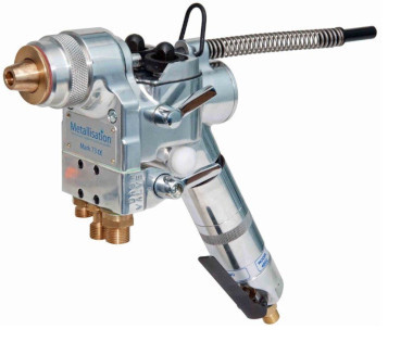 A metallic diesel fuel injection pump with a long lever and brass fittings.