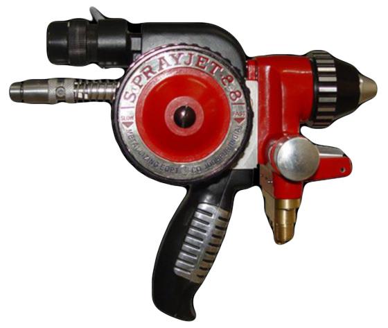 Retro toy ray gun with a red body, black grip, and a circular front detail.