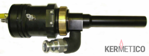 Black cylindrical mechanical device with a brass ring and a long black rod attached to a small elbow fitting.