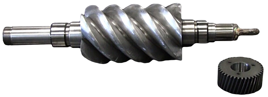 A metal auger drill bit with a helical spiral around a shaft and a separate knurled cap.