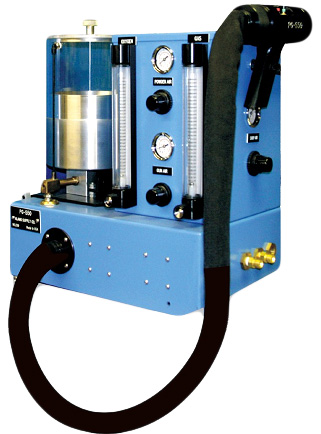 Blue industrial oil purification machine with a glass degassing chamber, pressure gauges, and a large black hose.
